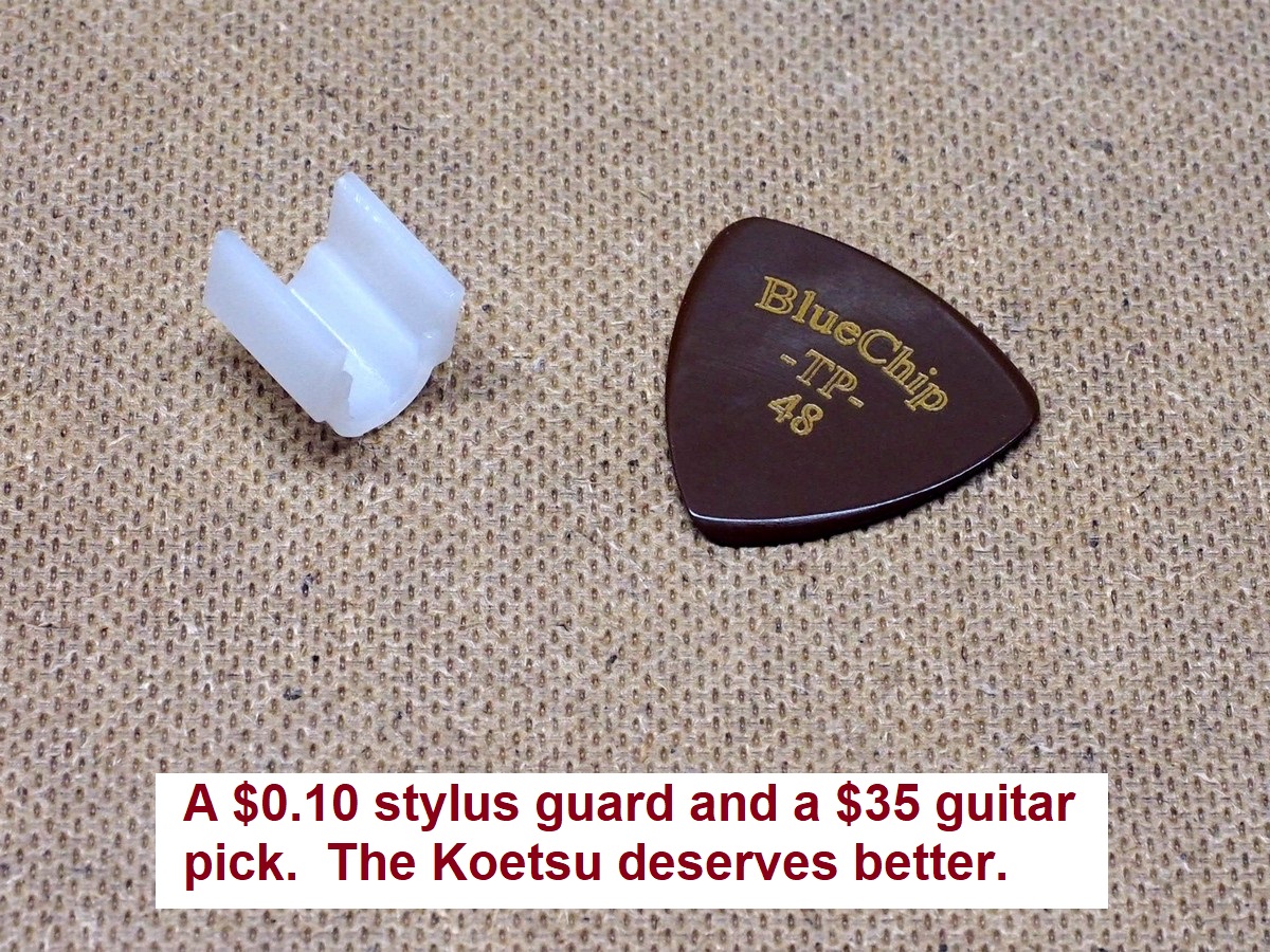 Koetsu Cartridge Carrier Galibier Design - Koetsu stylus guard and a guitar pick
